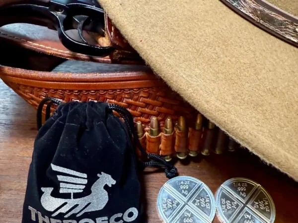 Cowboy hat, revolver, coins, and branded pouch.